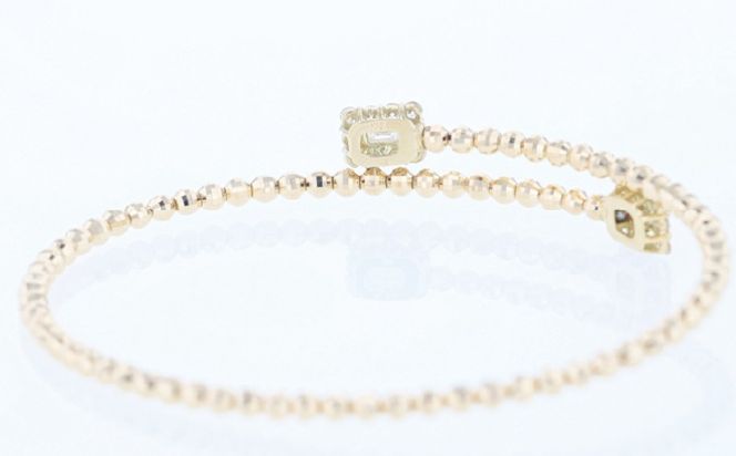 J095 アルカンシェルYGダイヤ形状記憶バングル（計 0.52ct）