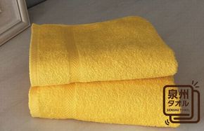 005A627 コーマカラーフェイスタオル 2枚（サフロンイエロー) 【泉州タオル 国産 吸水 薄手 普段使い 無地 シンプル 日用品】