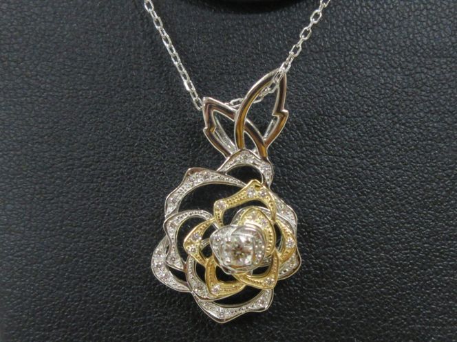 Pt950/K18YG H&Cダイヤ ベアリングペンダント SWCB012